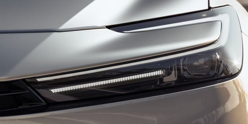 2026 Toyota Prius in St. Louis, MO headlight detail emphasizing LED design for improved nighttime visibility.