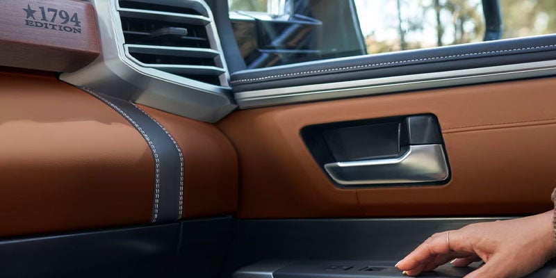 2026 Toyota Tundra in St. Louis, MO CrewMax interior with seating for five, leather-trimmed seats, heated and ventilated seating, and cabin storage for long drives and weekend trips.