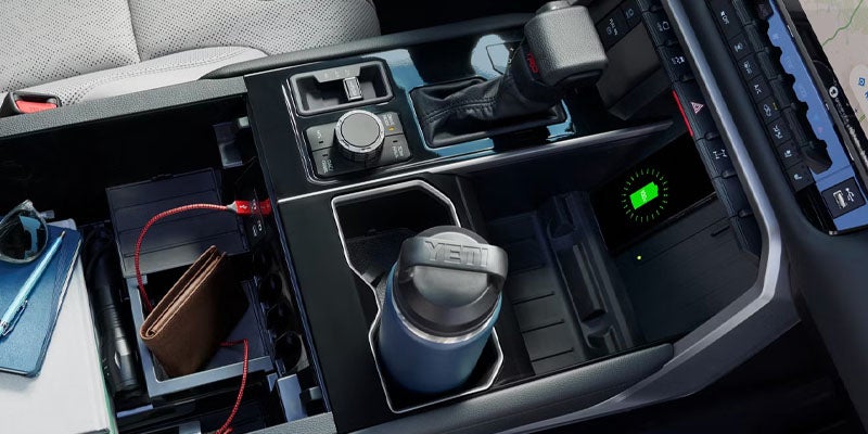 2026 Toyota Tundra in St. Louis, MO featuring a 14-inch touchscreen, 12.3-inch digital gauge cluster, SYNC 4 system, Apple CarPlay, Android Auto, and JBL audio for navigation and media along I-55 and local roads.